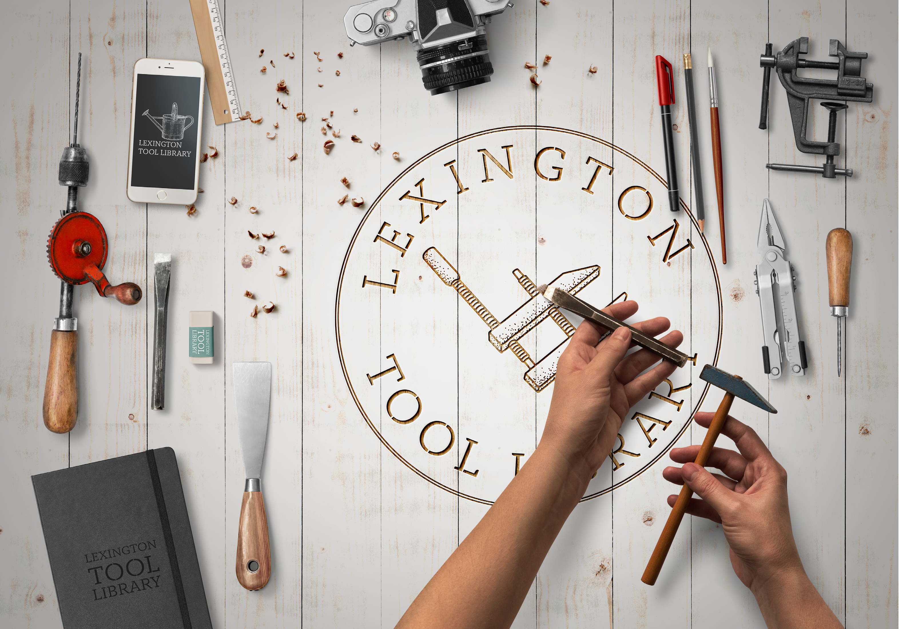 Picture of the Lexington Tool Library logo with hands and many small hand tools strewn about